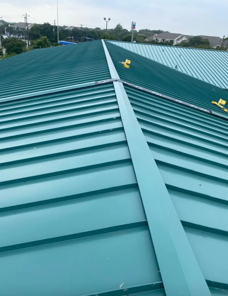 Green commercial metal roof ridge and valley for Metal Roof Repair in Payette