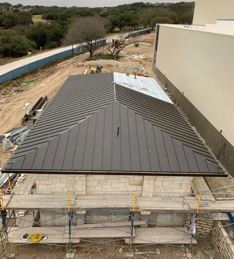 Metal roof new construction with scaffolding in Payette