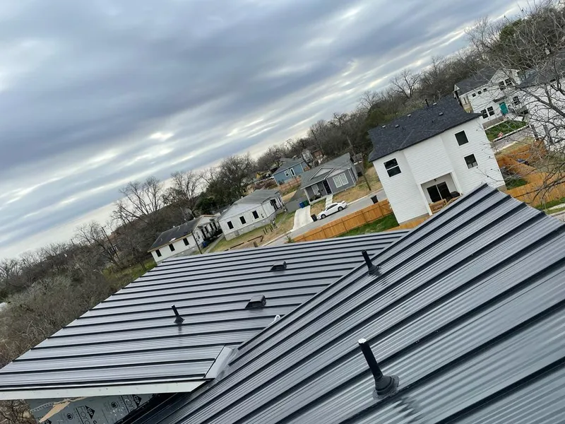 Standing seam metal roof panels with vents for Skylight Repair in Payette